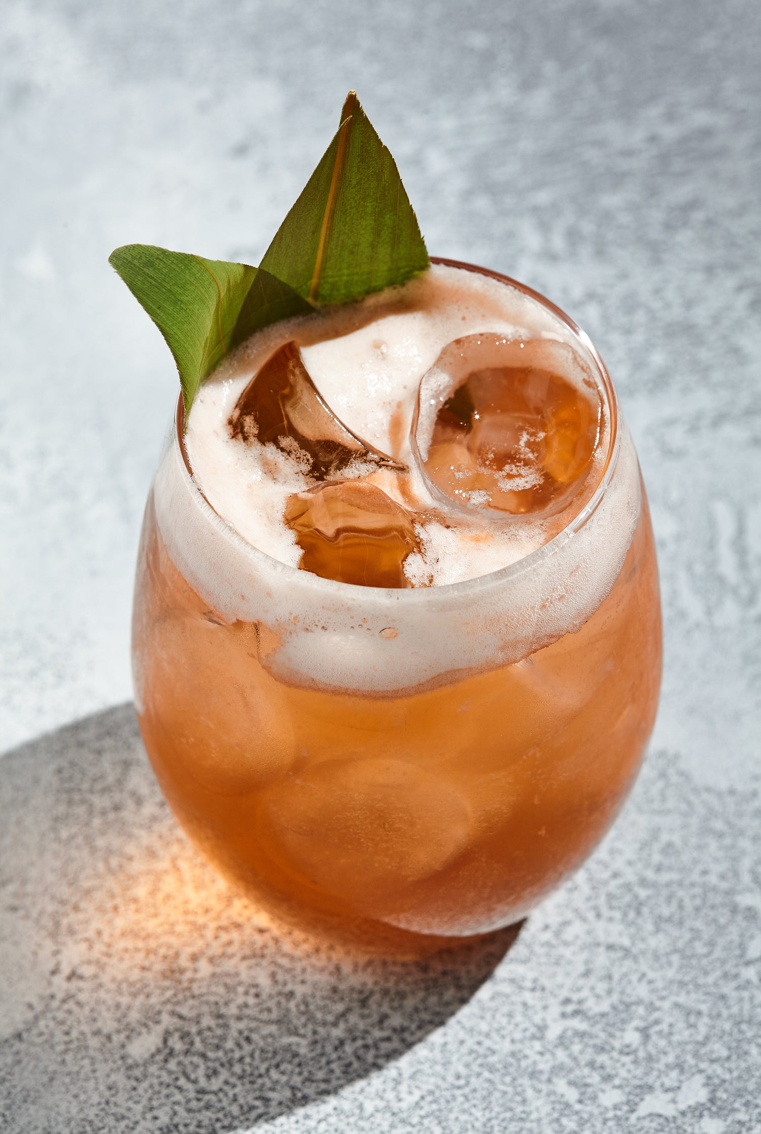 chupilca_Spritz_Cocktail_with_foam_from_egg_white._Rox_Cocktail_glass